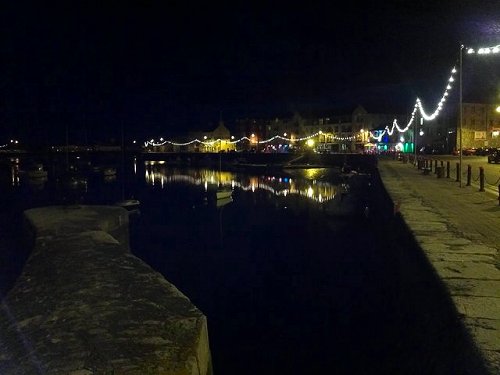 Boats in Dungarvan in Waterford at night